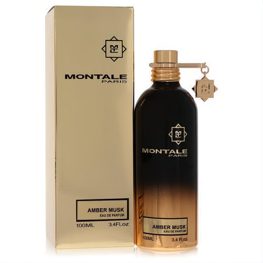 Luxurious Montale Amber Musk 3.4 oz Eau De Parfum in a sleek amber-gold gradient bottle with a matching gold box.