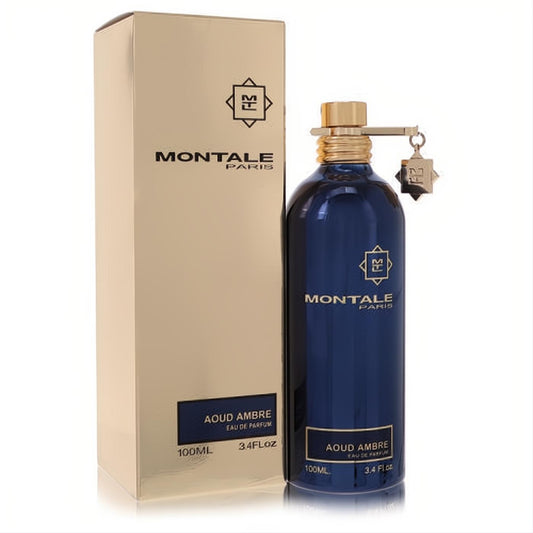 Luxurious Montale Aoud Ambre 3.4 oz unisex Eau De Parfum. Dark blue bottle with gold cap & charm, next to its elegant gold box.