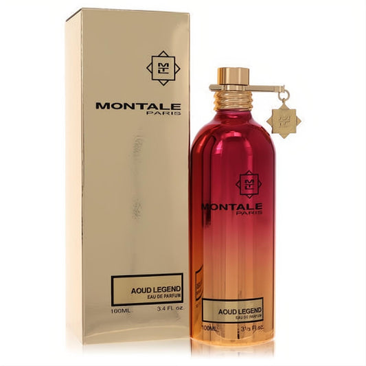 Montale Aoud Legend 3.4 oz EDP in a striking metallic red-gold gradient bottle with gold cap and charm, next to its sleek gold box.