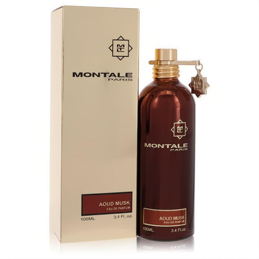 Elegant Montale Aoud Musk 3.4 oz Eau De Parfum. Features a rich dark brown bottle with a metallic gold cap and matching gold box.