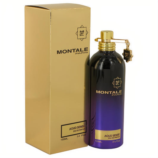 Montale Aoud Sense 3.4 oz unisex EDP. Sleek black-to-purple metallic bottle with gold cap and charm, alongside its elegant gold box.