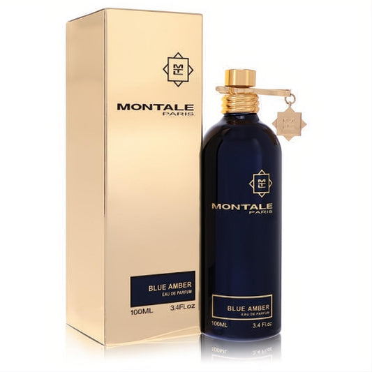 Elegant Montale Blue Amber 3.4 oz unisex Eau De Parfum. Deep blue metallic bottle, gold cap with charm, next to a sleek gold box.