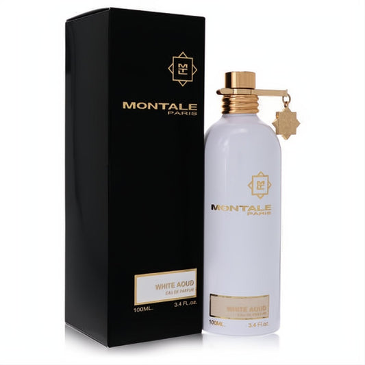 Luxurious Montale White Aoud 3.4 oz unisex EDP in a sleek white bottle with gold cap, star charm, and black box.