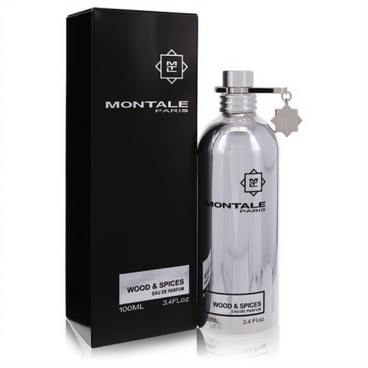 Sleek Montale Wood & Spices 3.4 oz Eau de Parfum. Iconic silver metallic bottle with charm next to its elegant black box.