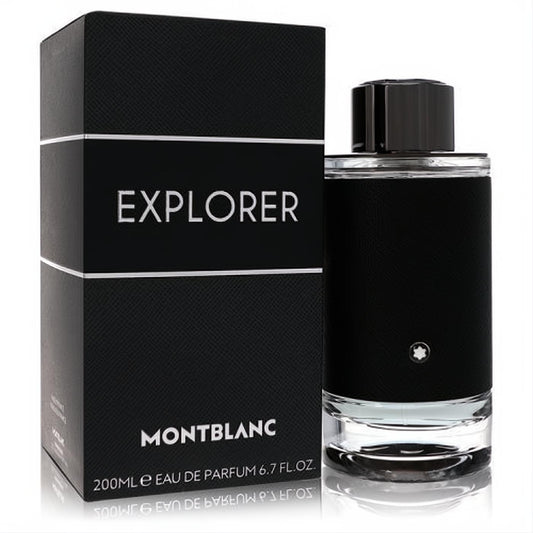 Montblanc Explorer 6.7 oz men's EDP. Sleek black bottle with textured sleeve, iconic star logo, clear base, and branded box.