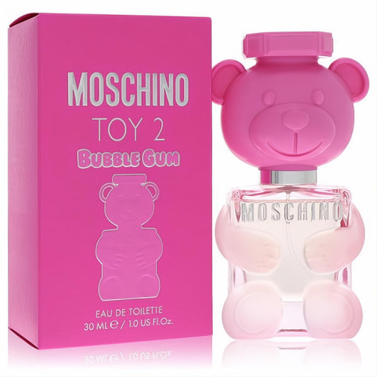 Vibrant pink Moschino Toy 2 Bubble Gum 1 oz Eau De Toilette spray, featuring a playful teddy bear bottle and matching box.