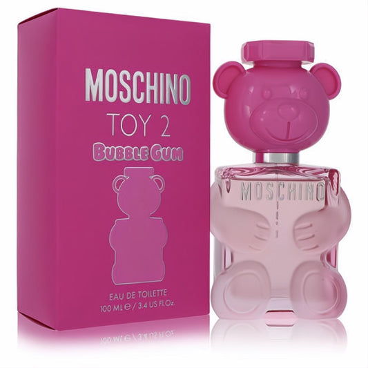 Moschino Toy 2 Bubble Gum EDT. Playful clear teddy bear bottle with light pink liquid, vibrant pink cap, and matching fuchsia box.