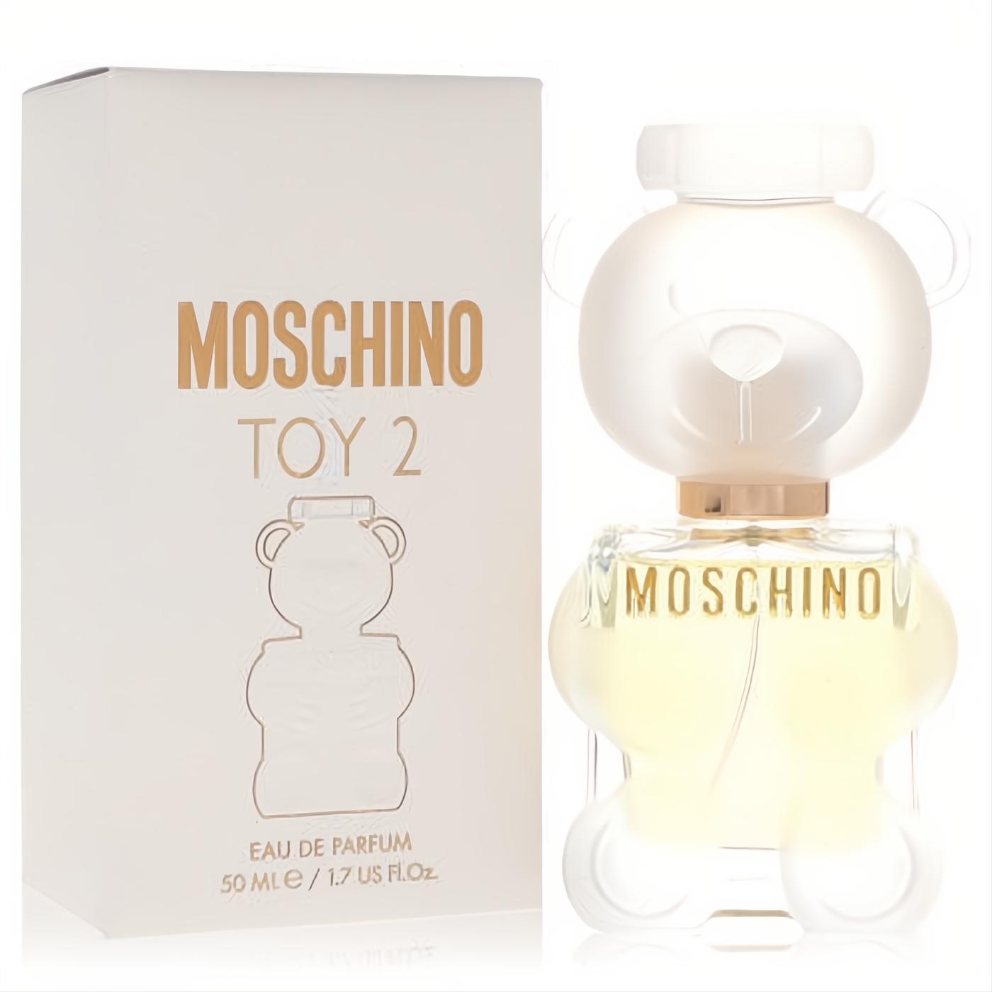 Moschino Toy 2 1.7 oz Eau De Parfum. Iconic clear glass teddy bear bottle with frosted white cap, gold accents, and matching branded box.