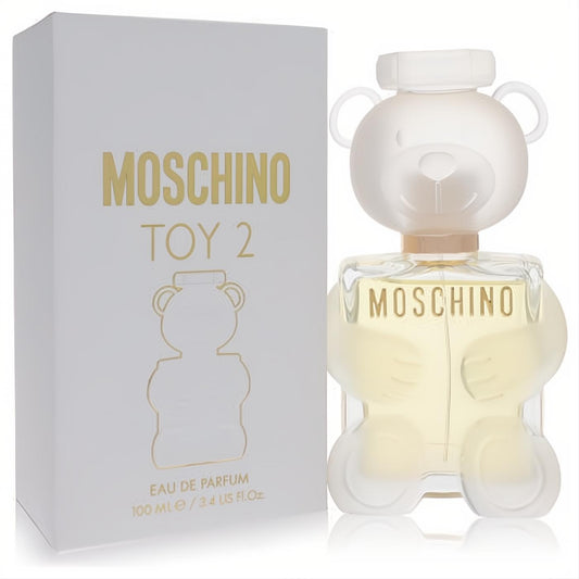 Moschino Toy 2 women's 3.4 oz Eau De Parfum. Playful clear glass teddy bear bottle with frosted head, light yellow fragrance, and white box with gold details.