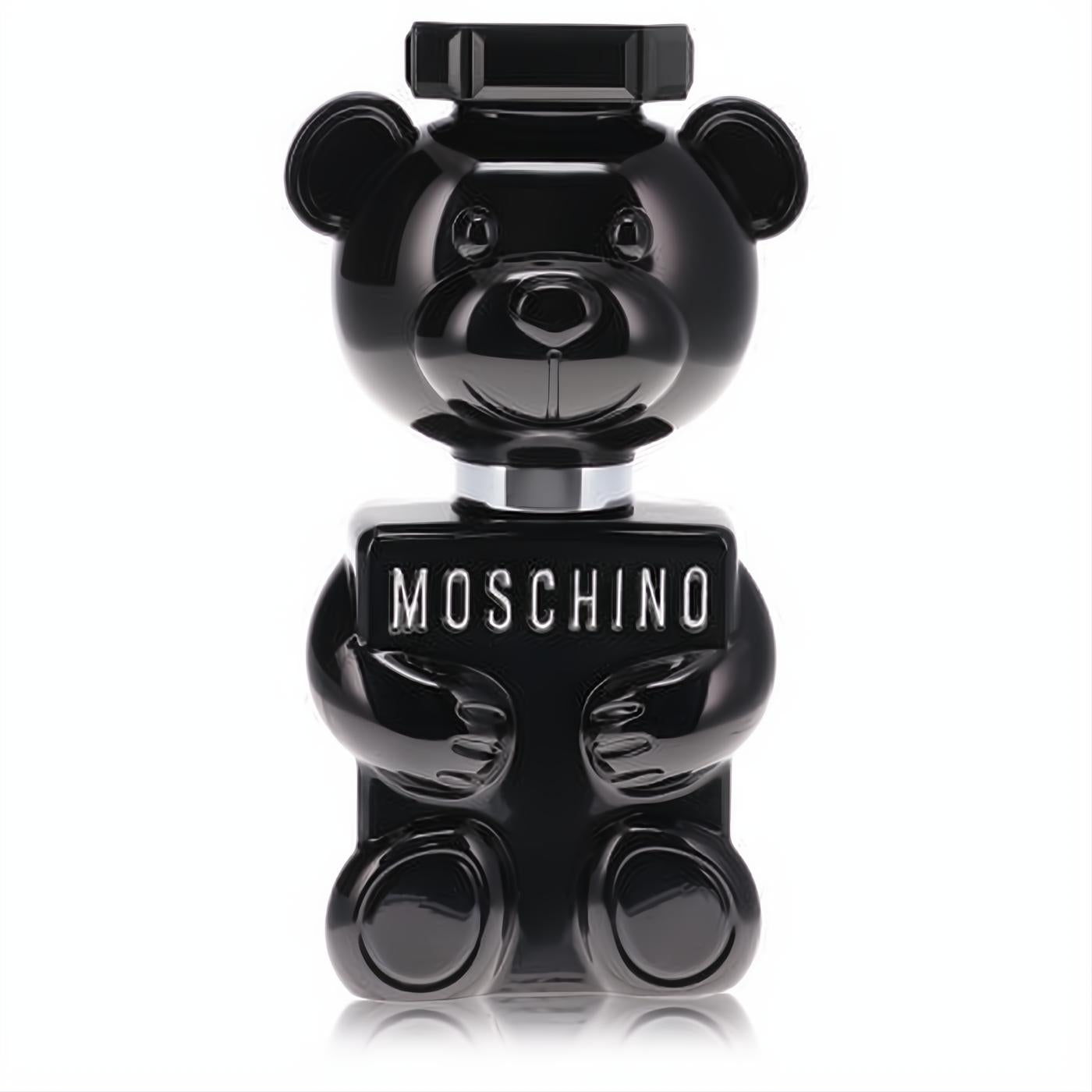 Iconic Moschino Toy Boy men's EDP spray in a glossy black teddy bear bottle with prominent silver branding.