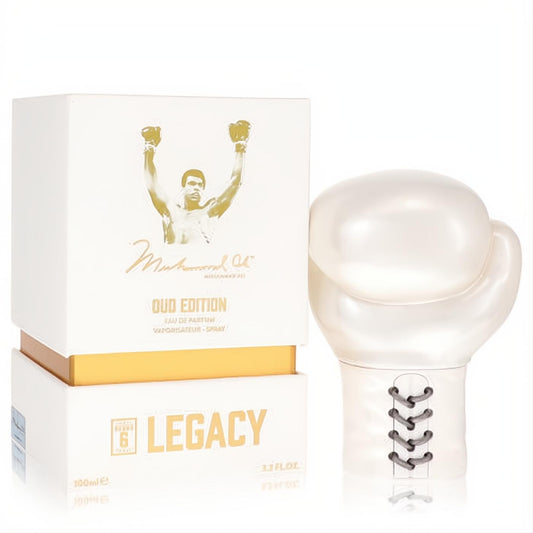 Muhammad Ali Legacy Round 6 Oud Edition 3.3 oz. Striking white boxing glove bottle with laces, next to its gold and white signature box.