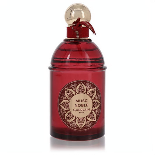 Luxurious Guerlain Musc Noble perfume in a rich red glass bottle with intricate gold label, elegant gold cap, and velvet ribbon.