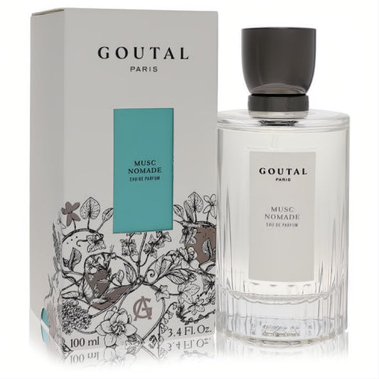 Elegant Annick Goutal Musc Nomade 3.4 oz EDP. Clear glass bottle, dark cap, refined white box with teal panel and botanical art.
