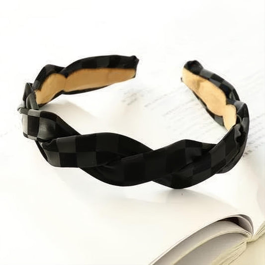 Elevate your style with this trendy muted black checkerboard print twisted headband. Soft edges ensure comfortable wear.