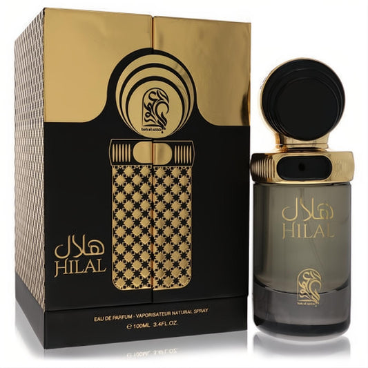 Elevate your scent with My Perfumes Hilal unisex EDP, 3.4 oz. Luxurious black and gold bottle and geometric pattern box.