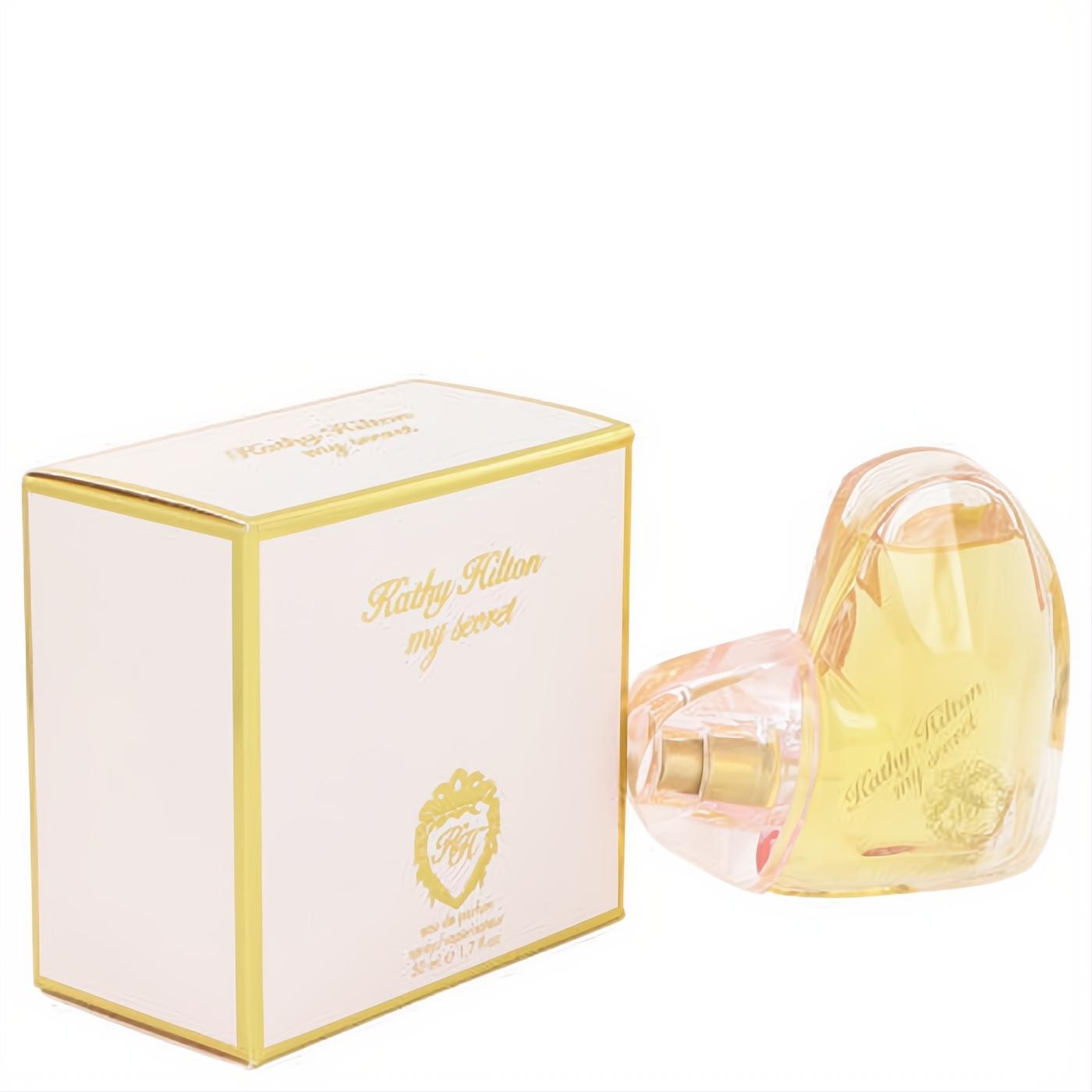 Kathy Hilton My Secret 1.7 oz EDP. Elegant heart-shaped bottle with pink base, gold accents, and a matching cream & gold box.