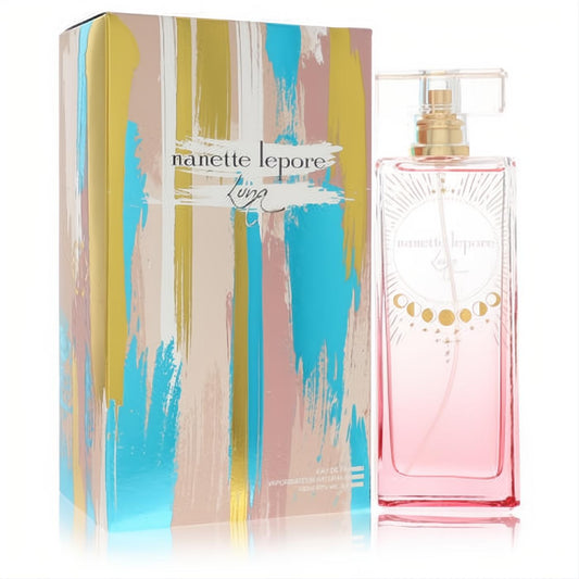 Nanette Lepore Luna 3.4 oz EDP: chic pink bottle with gold cap and sun design, paired with a vibrant abstract art box.