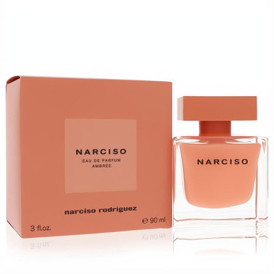 Narciso Rodriguez Ambree 3 oz EDP. Elegant clear bottle with warm amber liquid, square cap, and matching orange box.