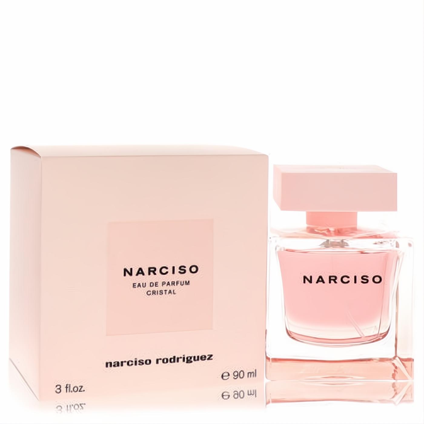Elegant Narciso Rodriguez Cristal 3 oz EDP spray. Clear glass bottle with radiant pink perfume, matching pink cap and box.