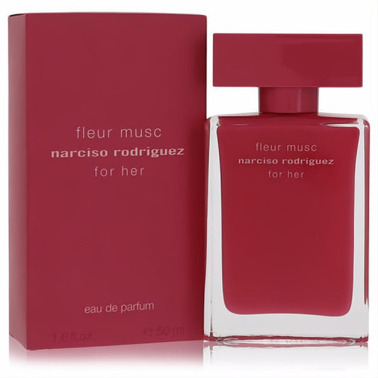 Vibrant fuchsia Narciso Rodriguez Fleur Musc 1.6 oz Eau De Parfum spray bottle and matching box. Luxurious women's fragrance.