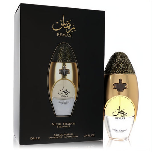 Niche Emarati Remas by Lattafa unisex fragrance. Elegant gold oval bottle with intricate textured cap and sleek black box. 3.4 oz.