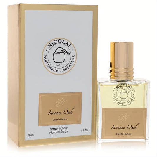 Nicolai Incense Oud 1 oz unisex Eau de Parfum: clear glass bottle, radiant gold cap, and elegant white and gold box.