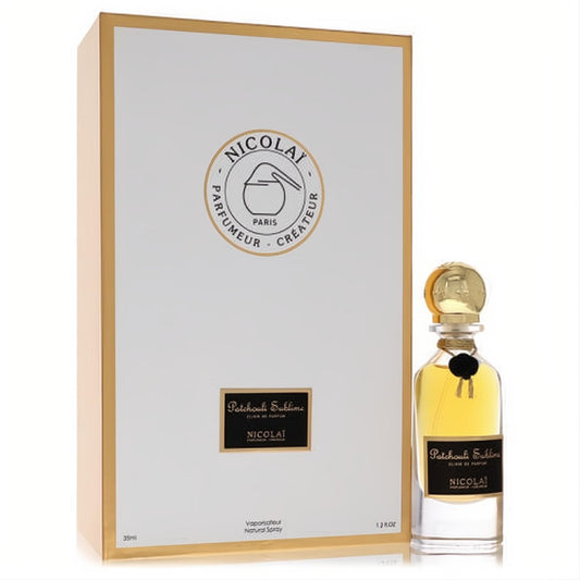 Nicolai Patchouli Sublime 1.2 oz Elixir De Parfum. Golden liquid in a clear bottle with ornate gold cap and white-gold luxury box.