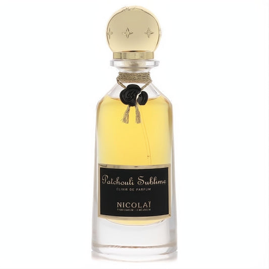 Luxurious Nicolai Patchouli Sublime Elixir De Parfum in a clear glass bottle with golden liquid, black label, ornate gold cap, and black rose accent.