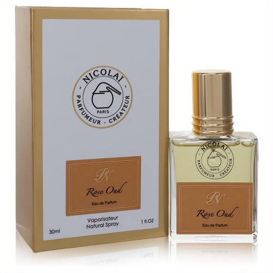 Luxurious Nicolai Rose Oud 1 oz unisex Eau de Parfum. Clear glass bottle with elegant gold cap and matching white & gold box.