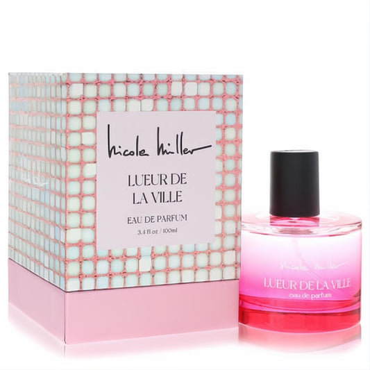 Nicole Miller Lueur De La Ville 3.4 oz Eau De Parfum. Elegant pink ombre bottle and dazzling mosaic gift box.