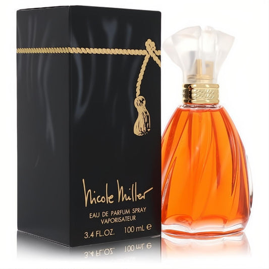Elegant Nicole Miller 3.4 oz Eau De Parfum in a unique amber fluted glass bottle with a clear cap, next to its black box with gold tassel.