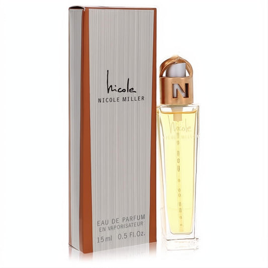 Nicole by Nicole Miller .5 oz Eau De Parfum spray in a sleek clear bottle with a gold "N" cap, beside its elegant gray and brown box.