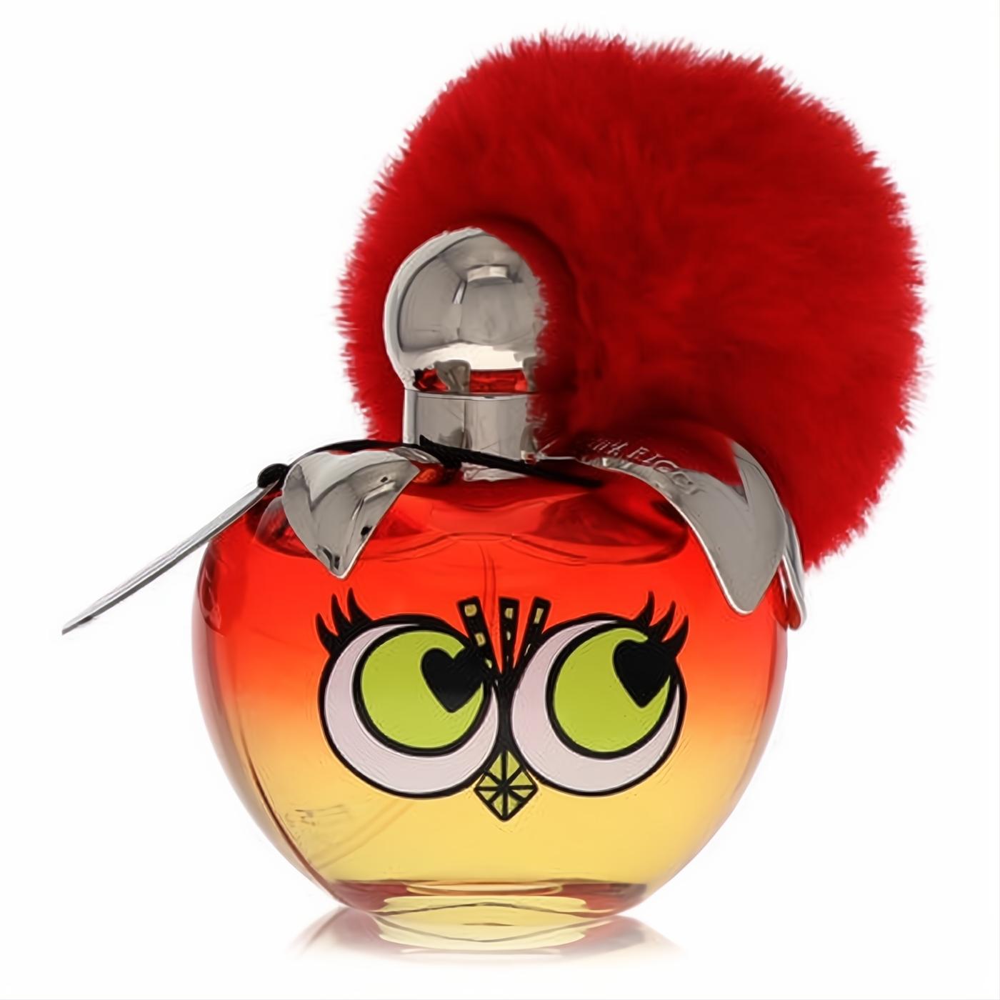 Nina Ricci Les Monstres 2.7 oz EDT: playful red-yellow gradient bottle, bold green eyes, and a vibrant red furry cap.