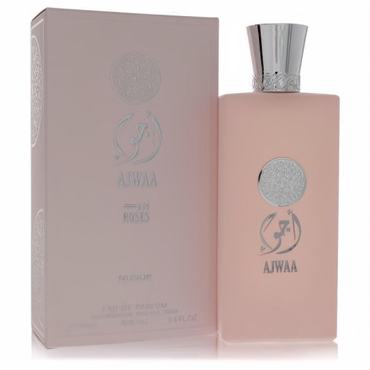 Luxurious Nusuk Ajwaa Roses 3.4 oz EDP. Frosted pink bottle with elegant silver cap and distinct Arabic design.