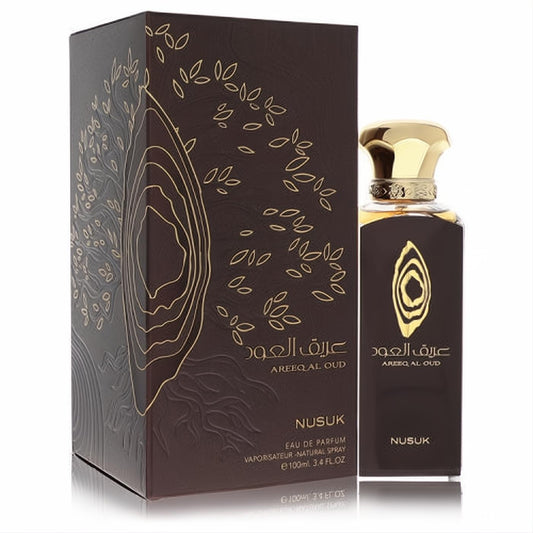 Nusuk Areeq Al Oud unisex 3.4 oz EDP. Dark brown bottle and box with elegant gold oud wood design and luxurious gold cap.