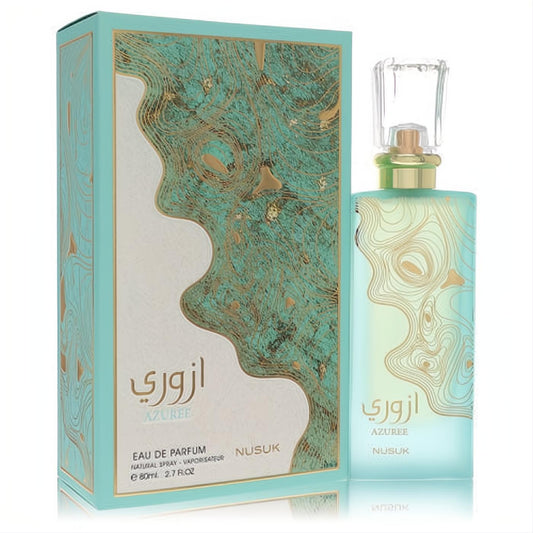 Nusuk Azuree 2.7 oz Eau De Parfum. Frosted aqua bottle with elegant gold swirl design and clear cap, beside its matching box.