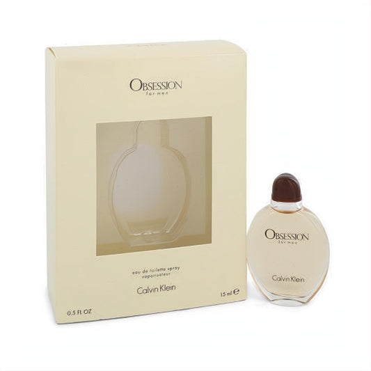 Calvin Klein Obsession 0.5 oz EDT spray. Elegant oval glass bottle with dark cap, displayed next to its cream box with clear window.
