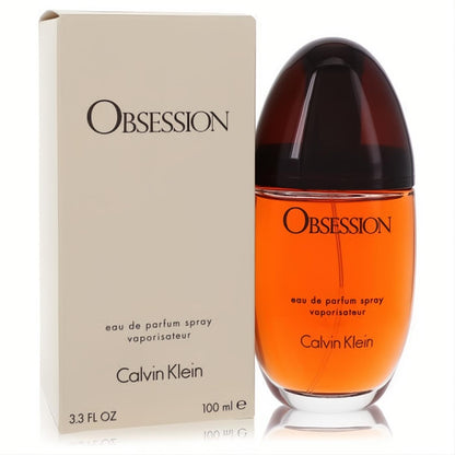 Calvin Klein Obsession 3.3 oz EDP spray: iconic amber-hued bottle with a sleek dark cap, presented with its elegant beige box.