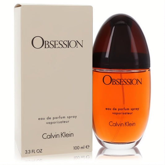 Calvin Klein Obsession 3.3 oz EDP spray: iconic amber-hued bottle with a sleek dark cap, presented with its elegant beige box.