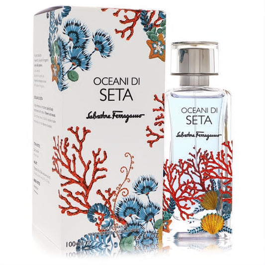 Oceani Di Seta by Salvatore Ferragamo 3.4 oz unisex perfume. Bottle and box feature vibrant red coral, blue flora, gold seashell design.