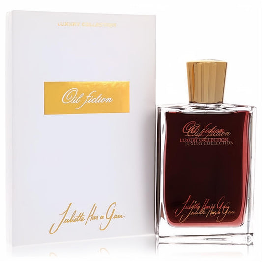 Juliette Has a Gun Oil Fiction EDP. Luxurious dark red glass bottle with gold cap and elegant white "Luxury Collection" box.