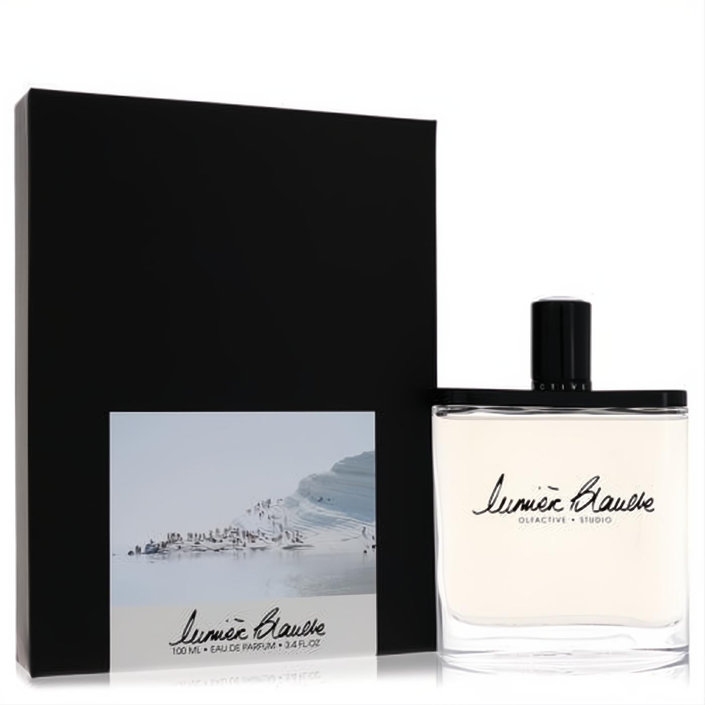 Olfactive Studio Lumiere Blanche 3.4 oz unisex EDP. Clear glass bottle, black cap, and elegant matte black box with scenic label.