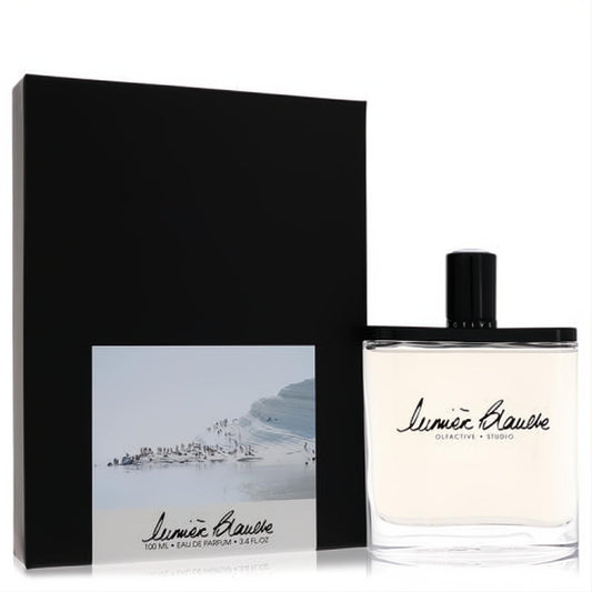Olfactive Studio Lumiere Blanche 3.4 oz unisex EDP. Clear glass bottle, black cap, and elegant matte black box with scenic label.