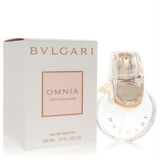 Luxurious Bvlgari Omnia Crystalline 3.4 oz EDT spray. Clear glass bottle with unique interlocking design and rose gold accents, next to its elegant white box.