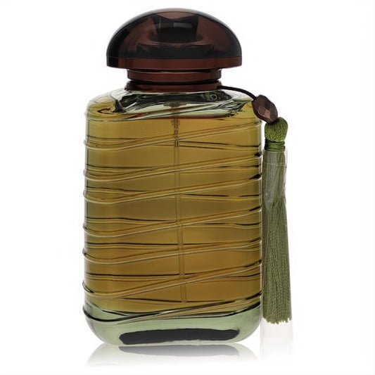 Exotic Giorgio Armani Onde Extase 1.7 oz EDP bottle. Features amber liquid, ribbed glass, dark dome cap, and a chic green tassel.