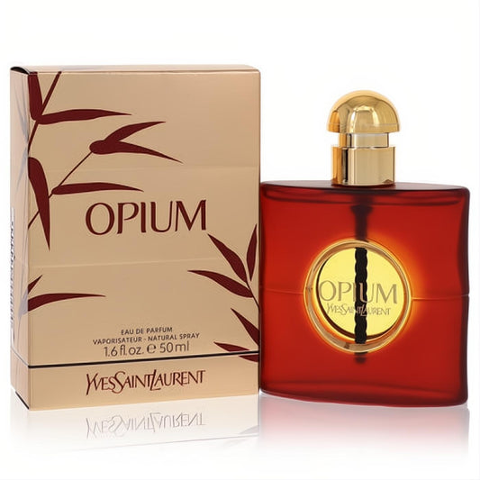 YSL Opium 1.6 oz Eau De Parfum. Striking red bottle with gold cap and label, paired with a luxurious gold box featuring bamboo.