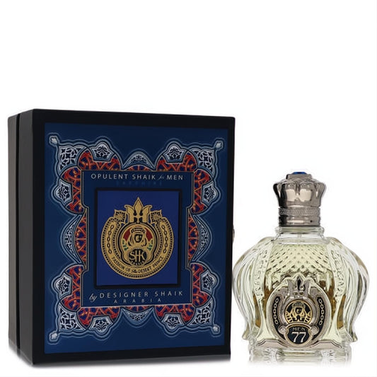 Luxurious Opulent Shaik No. 77 men's fragrance. Elegant clear glass bottle with silver crown cap next to an ornate dark blue and gold gift box.