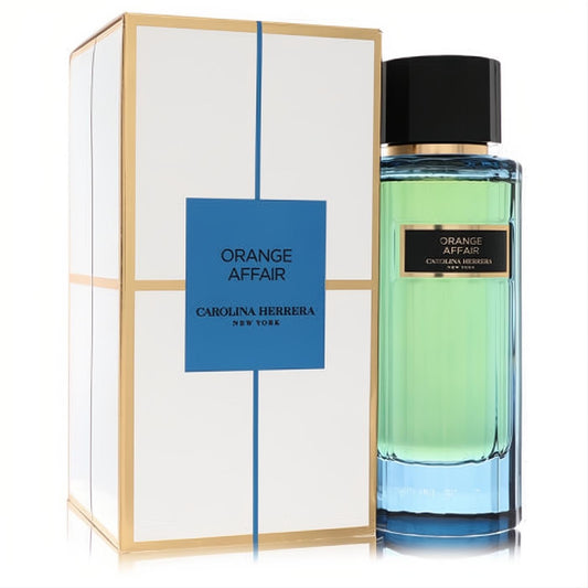 Carolina Herrera Orange Affair 3.4 oz unisex EDT. Vibrant green liquid in a sleek blue glass bottle with black cap and elegant white & gold box.