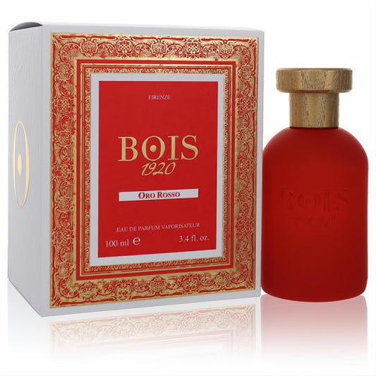Bois 1920 Oro Rosso 3.4 oz EDP: a striking matte red bottle with gold cap, beside its luxurious white and gold ornate box.