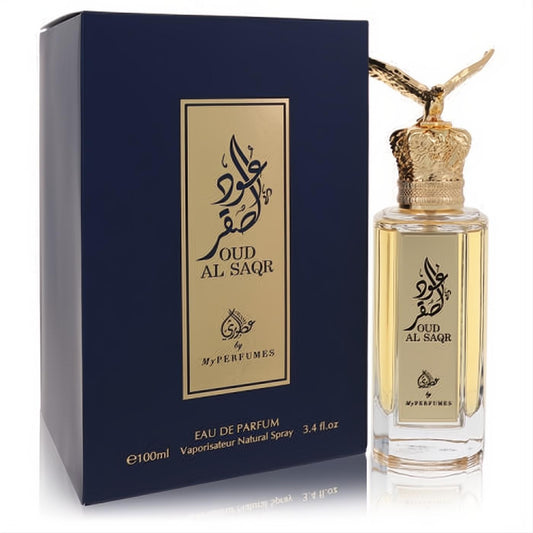 Oud Al Saqr 3.4 oz unisex EDP spray. Clear bottle with majestic gold eagle crown cap, beside a sophisticated navy box.